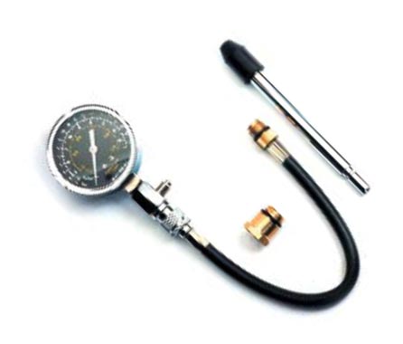 Проверка компрессии в цилиндрах двигателя автомобиля Chevrolet Lacetti хэтчбек 1 Компрессометр